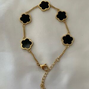 Elegant Gold and Black Flower Bracelet